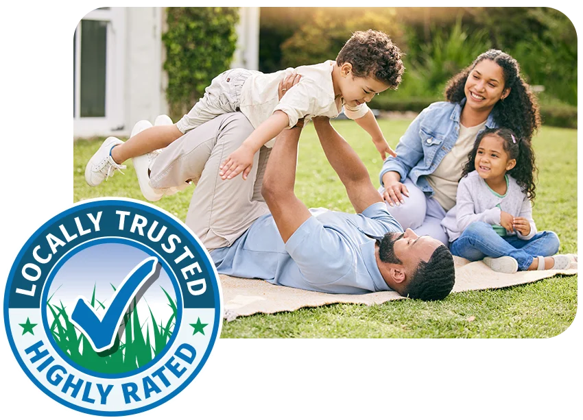 family enjoying a healthy green yard