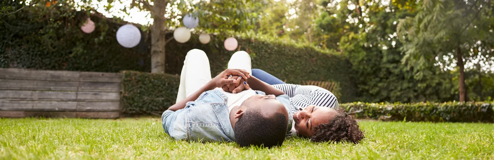 couple laying in grass